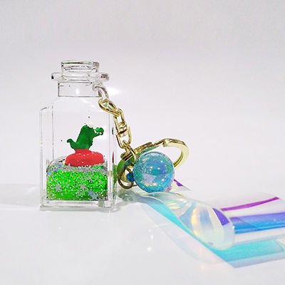 KEYCHAIN SQUARE BOTTLE CROC